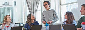 Person talking in a conference room      
